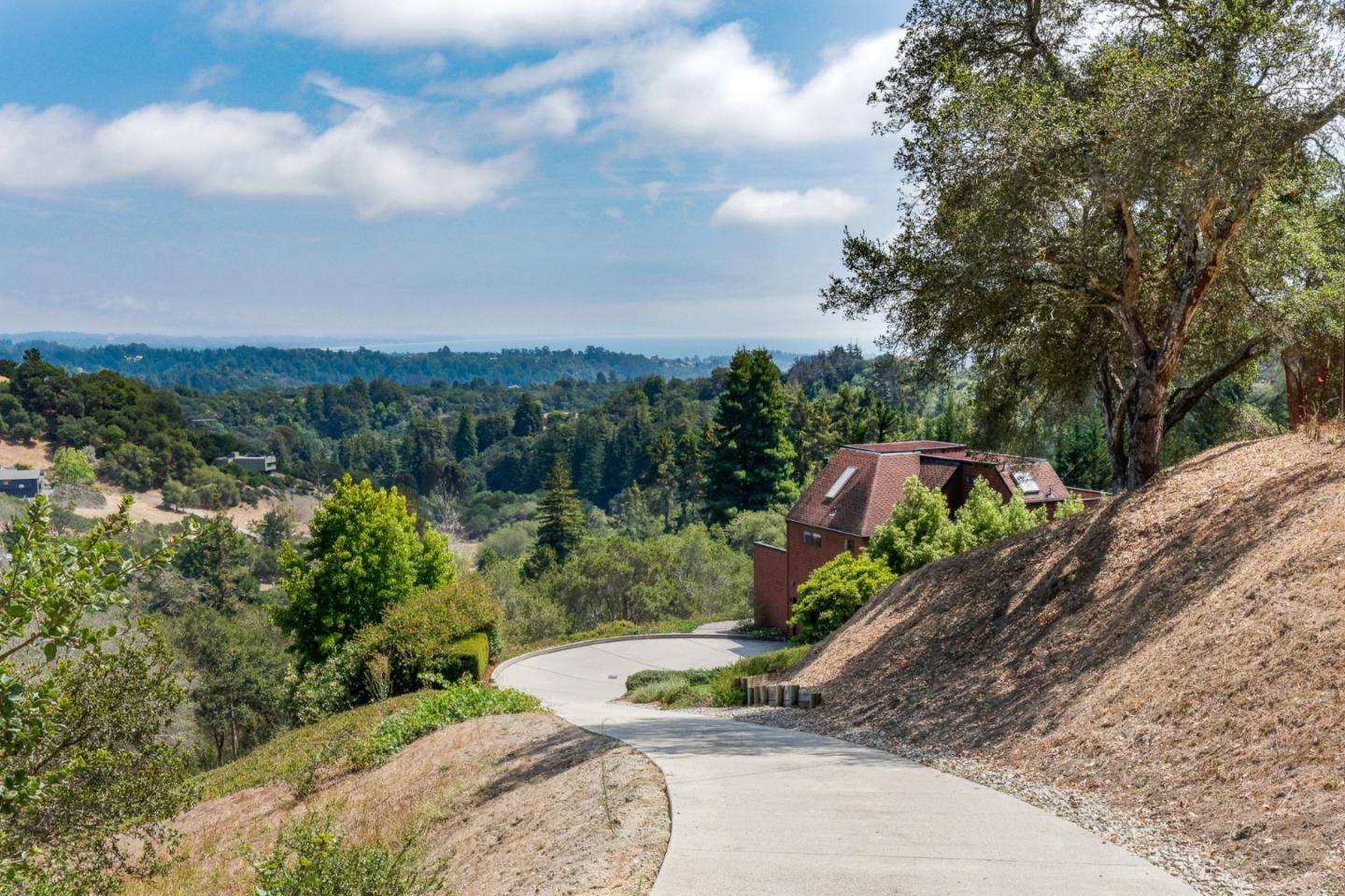 185 La Cima Street Soquel, CA 95073 - Photo 2 of 39 a view of a garden with a lake