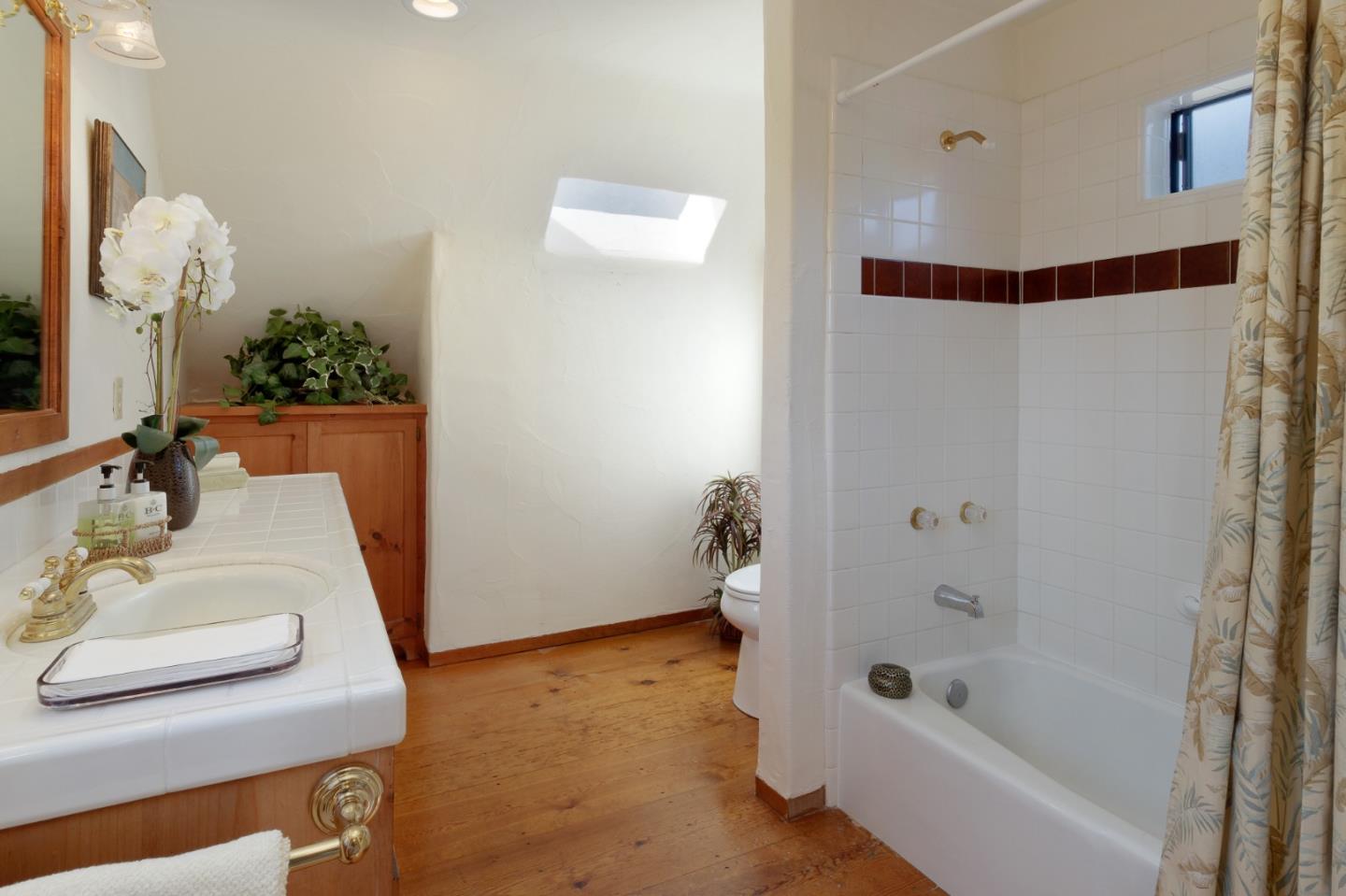 185 La Cima Street Soquel, CA 95073 - Photo 33 of 39 a bathroom with a tub shower and sink