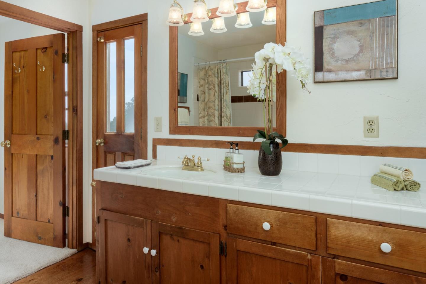 185 La Cima Street Soquel, CA 95073 - Photo 34 of 39 a bathroom with a sink and a mirror