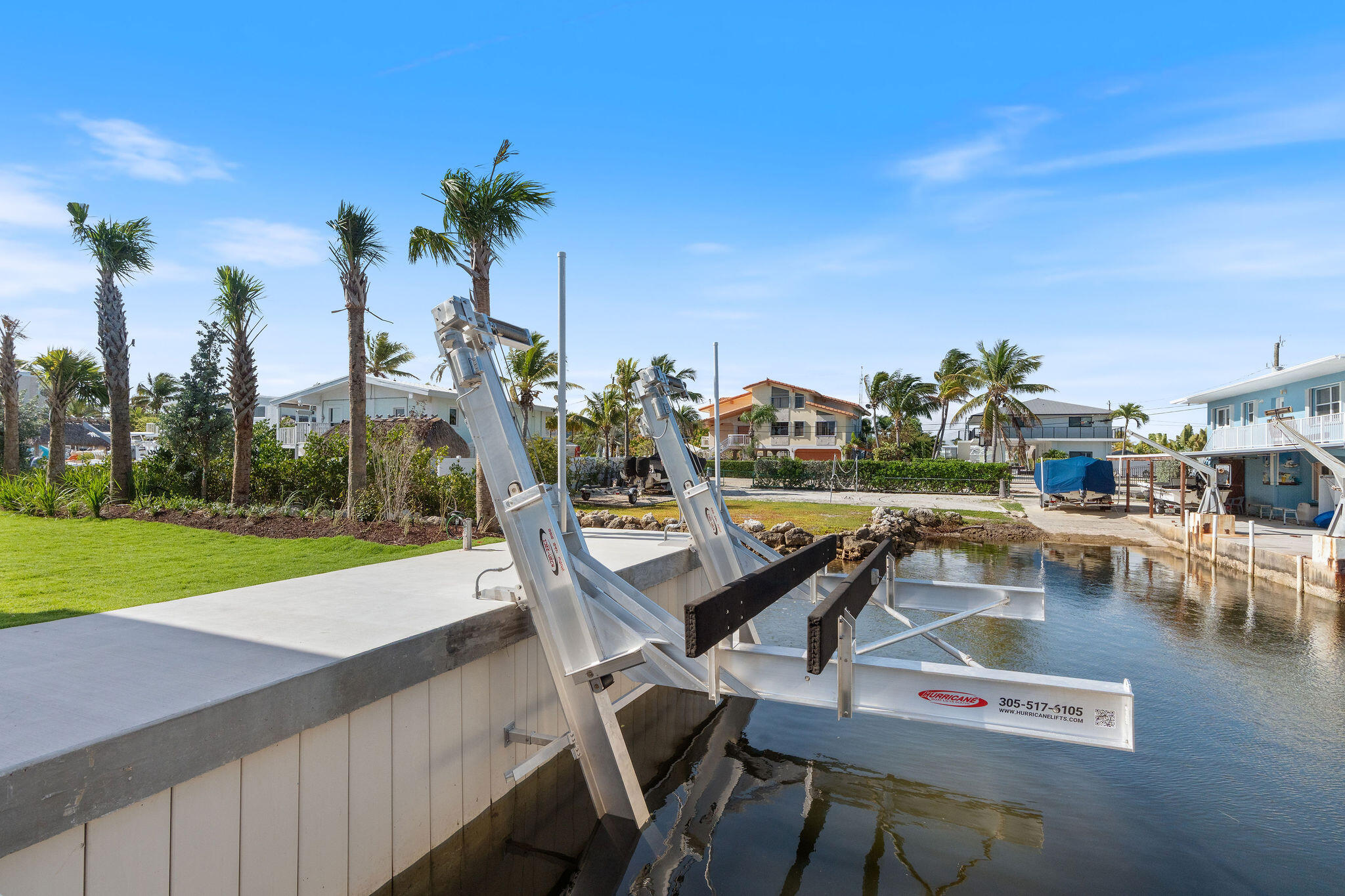 1002 Snapper Lane Key Largo, FL 33037 - Photo 69 of 106 a view of a swimming pool with lounge chairs