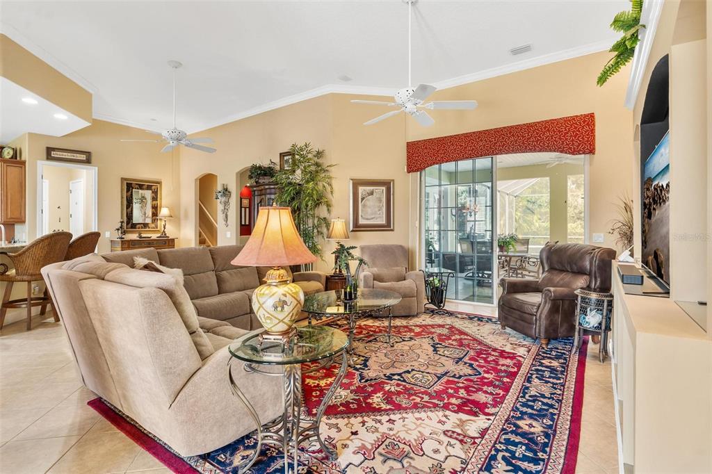 5903 Spinnaker Loop Lady Lake, FL 32159 - Photo 15 of 73 a living room with furniture and a large window