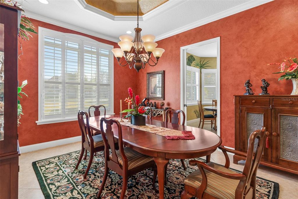 5903 Spinnaker Loop Lady Lake, FL 32159 - Photo 19 of 73 a view of a dining room with furniture and window