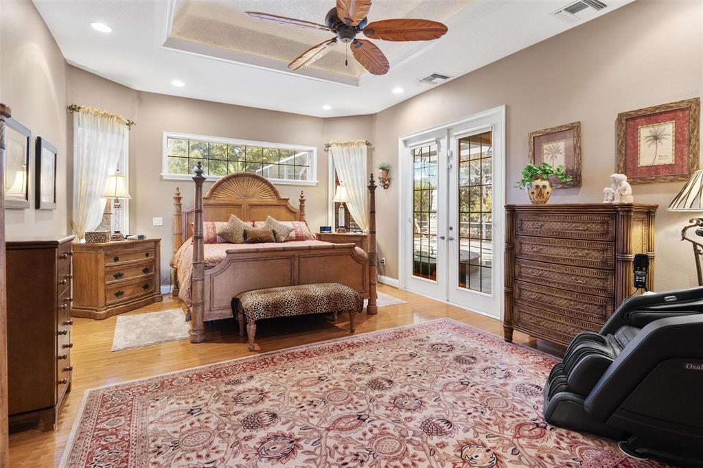 5903 Spinnaker Loop Lady Lake, FL 32159 - Photo 29 of 73 a bedroom with furniture and a fireplace