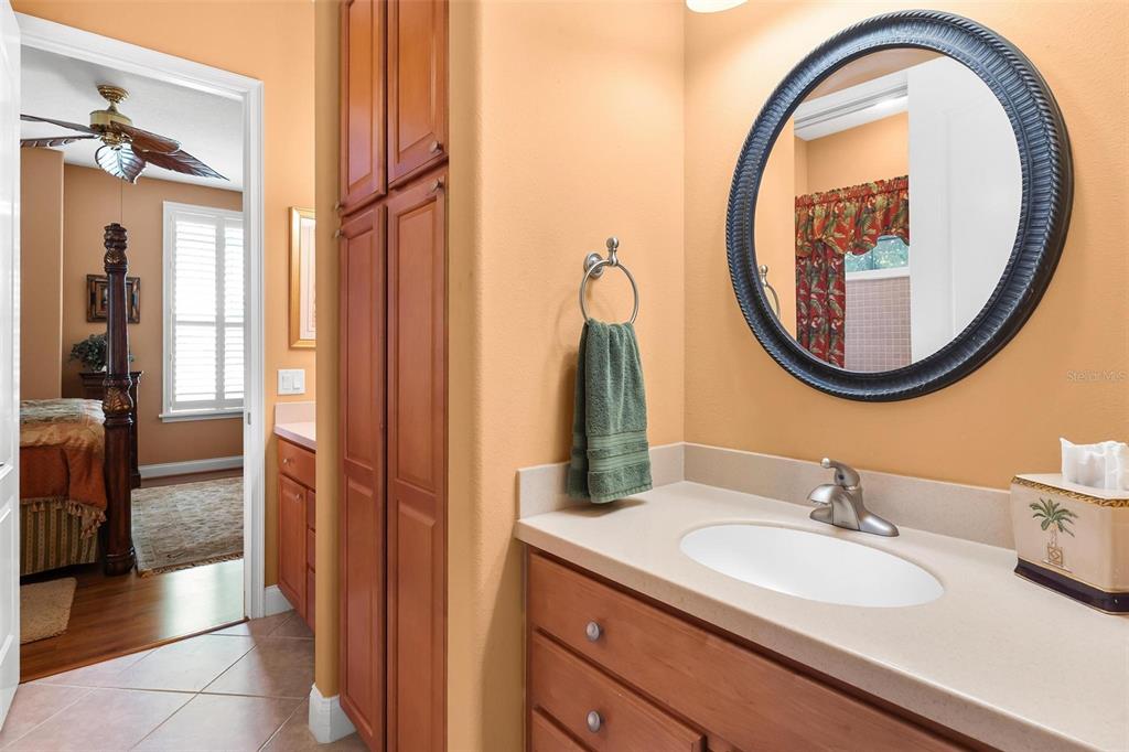 5903 Spinnaker Loop Lady Lake, FL 32159 - Photo 42 of 73 a bathroom with a sink and a mirror