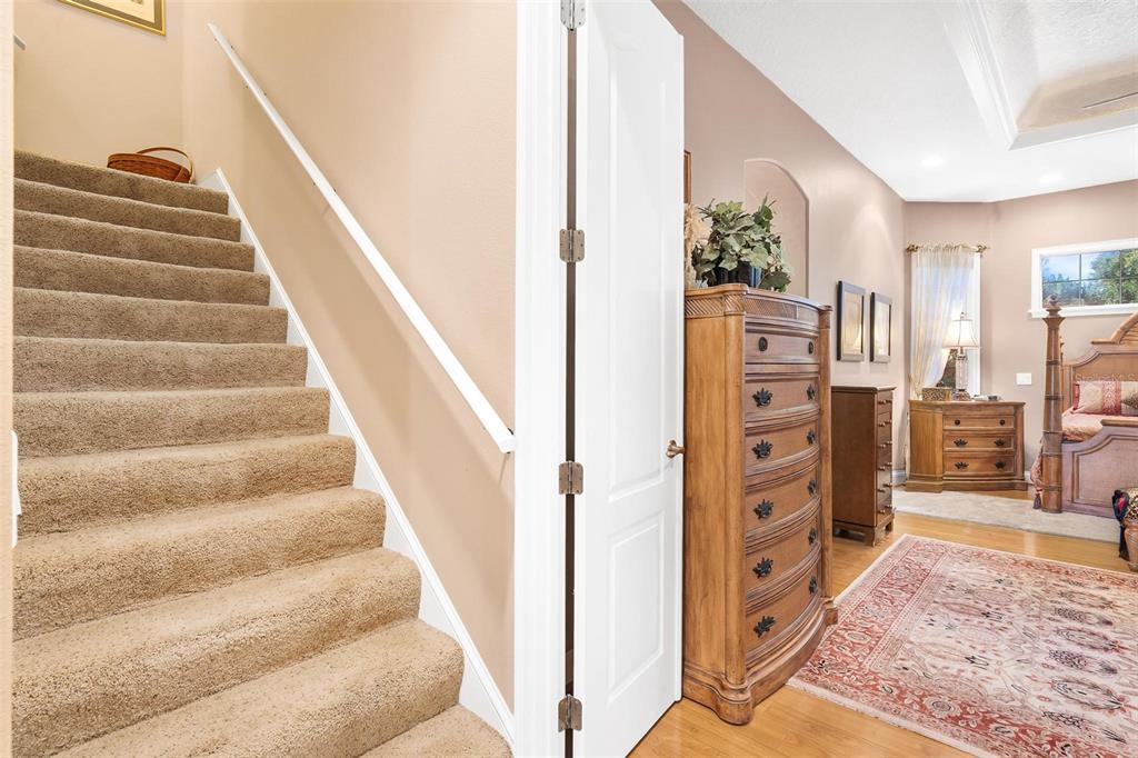 5903 Spinnaker Loop Lady Lake, FL 32159 - Photo 47 of 73 a view of staircase with white walls and windows