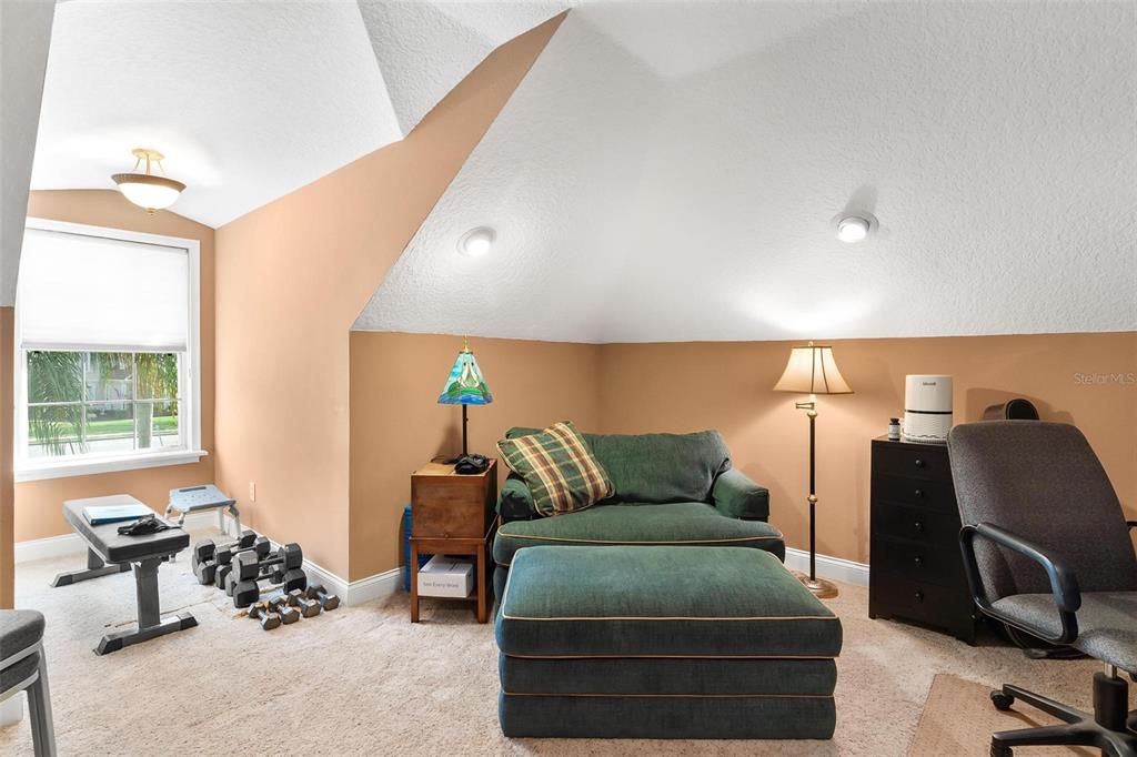 5903 Spinnaker Loop Lady Lake, FL 32159 - Photo 49 of 73 a living room with furniture and a window