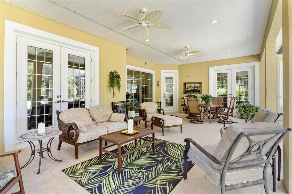 5903 Spinnaker Loop Lady Lake, FL 32159 - Photo 52 of 73 a living room with furniture and a large window