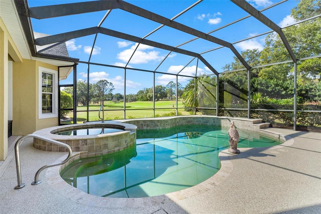 5903 Spinnaker Loop Lady Lake, FL 32159 - Photo 55 of 73 a patio with a yard table and chairs