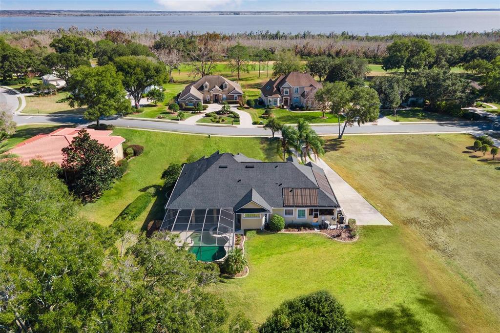 5903 Spinnaker Loop Lady Lake, FL 32159 - Photo 65 of 73 an aerial view of residential houses with outdoor space and swimming pool