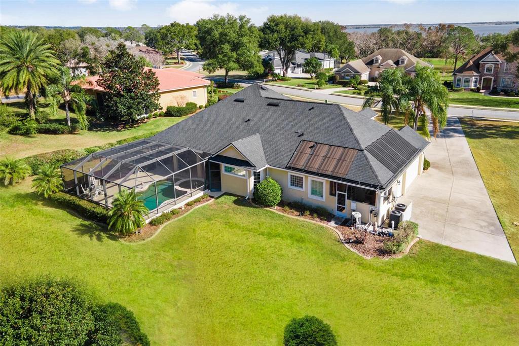 5903 Spinnaker Loop Lady Lake, FL 32159 - Photo 66 of 73 an aerial view of a house with swimming pool