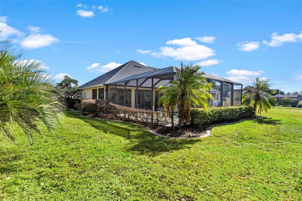 5903 Spinnaker Loop Lady Lake, FL 32159 - Photo 71 of 73 a front view of a house with a yard