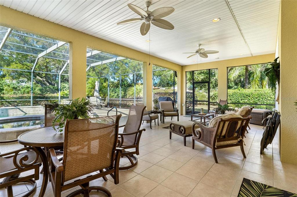 5903 Spinnaker Loop Lady Lake, FL 32159 - Photo 10 of 73 a view of a dining room with furniture window and outside view