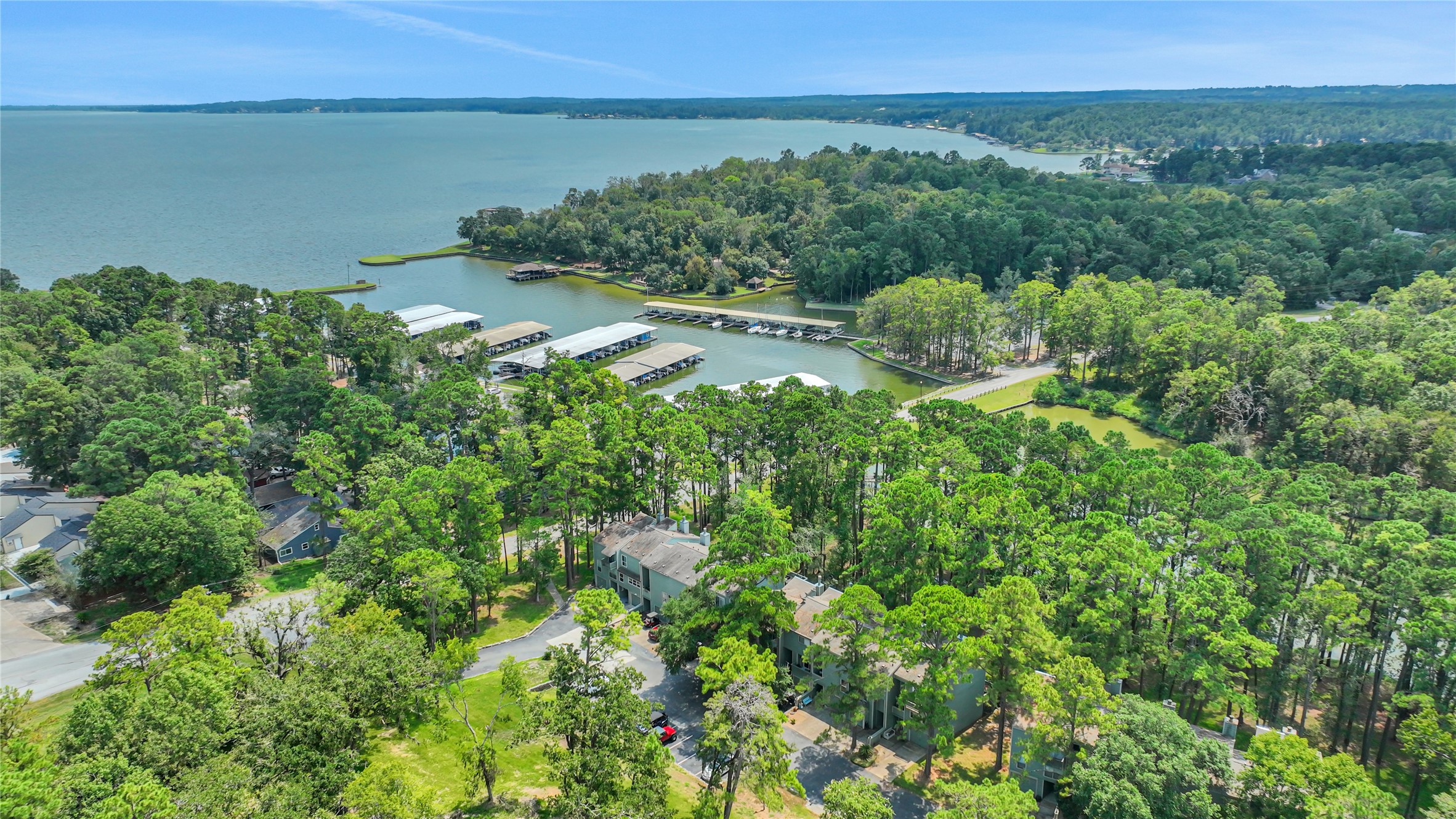 146 Villa Way Coldspring, TX 77331 - Photo 3 of 37 Located close to Cape Royale Marina with a view of the marina inlet