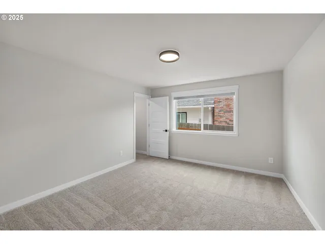 a view of a room with an empty space