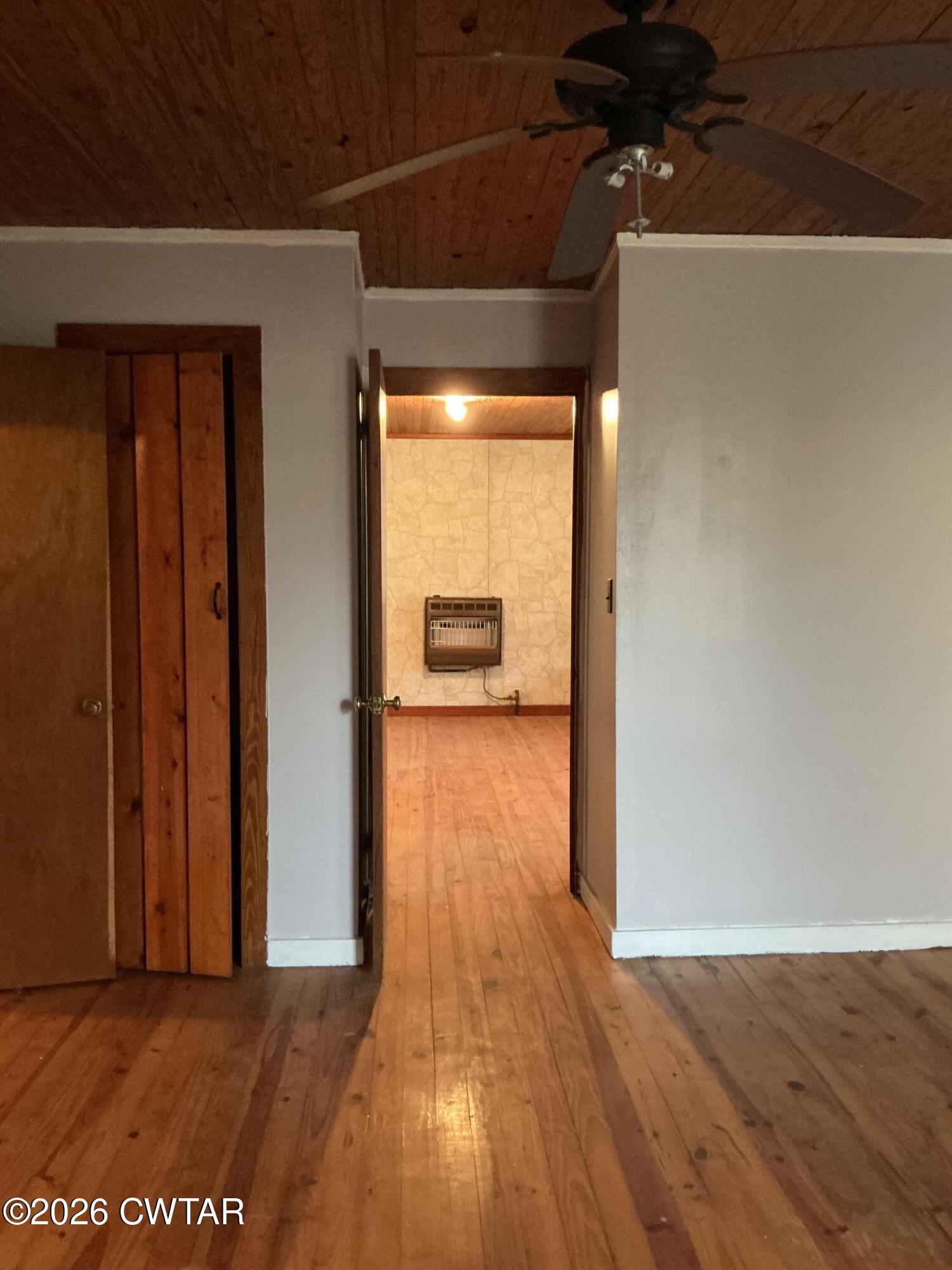 84 Carter Street Alamo, TN 38001 - Photo 23 of 25 a view of a hallway with wooden floor
