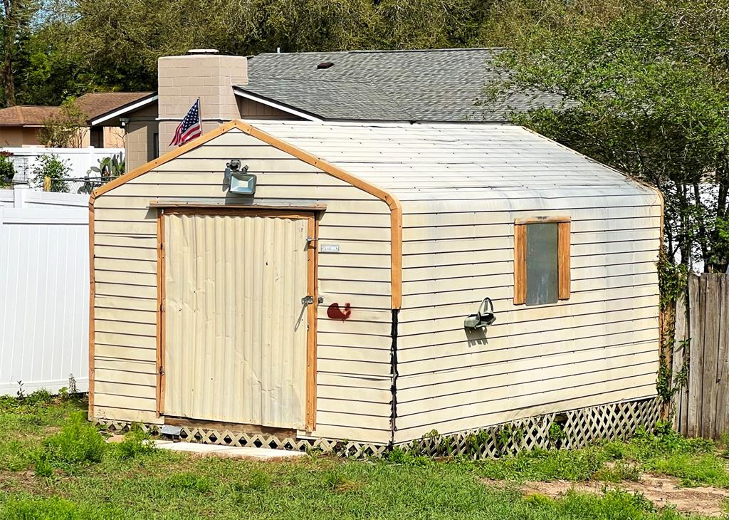 2307 Merrily Circle North Seffner, FL 33584 - Photo 24 of 26 a view of a house with a yard