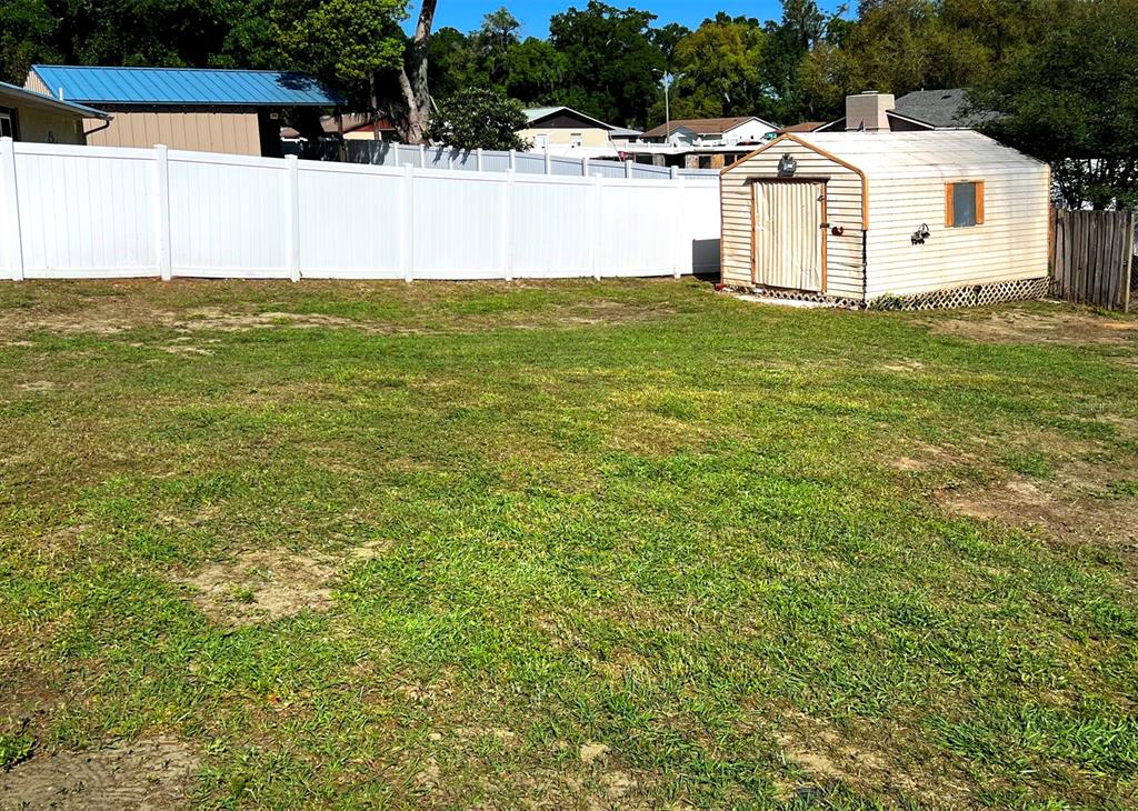 2307 Merrily Circle North Seffner, FL 33584 - Photo 25 of 26 a view of white house with a yard