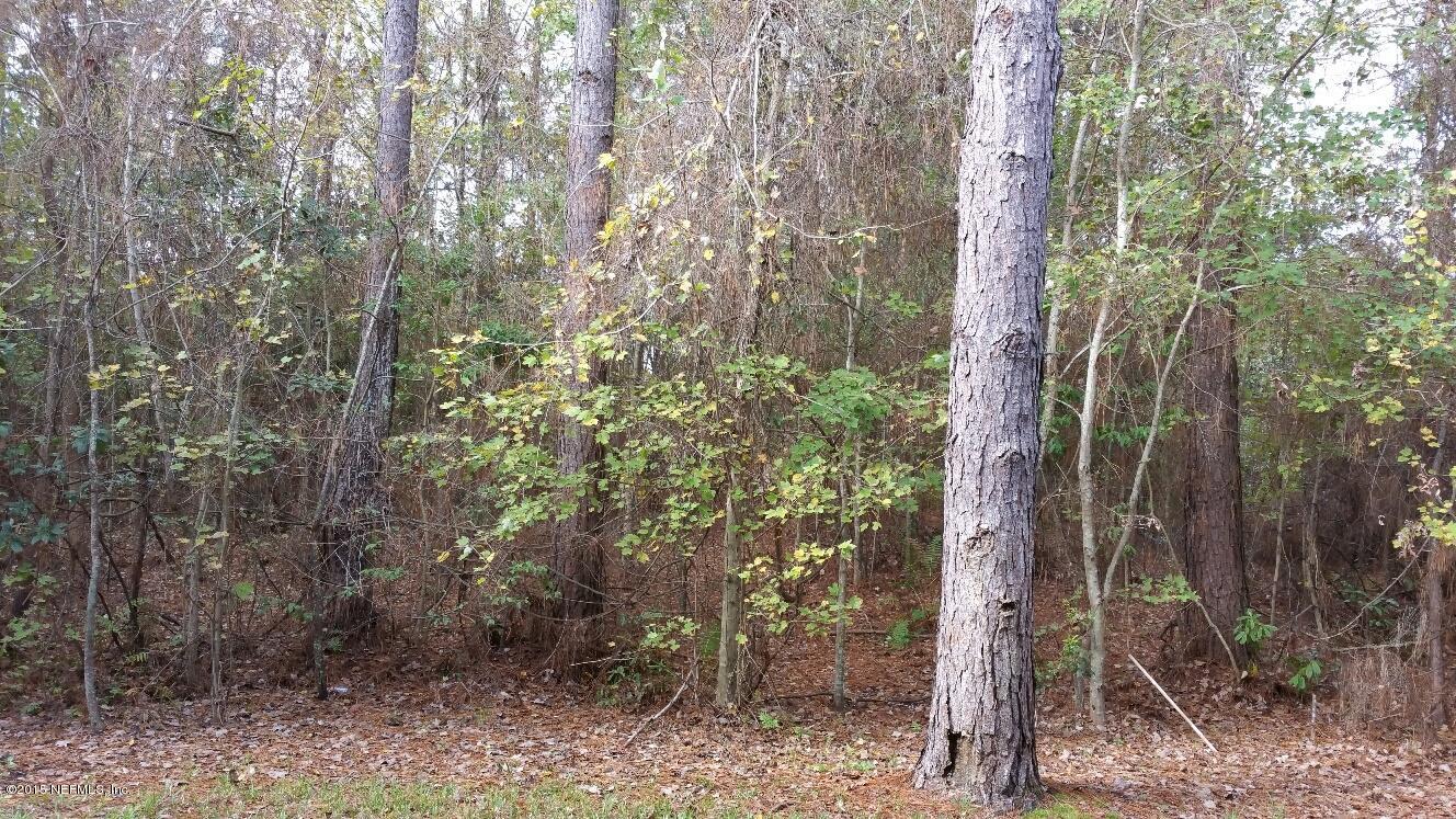 7920 Merrill Road, Unit 1804 Jacksonville, FL 32277 - Photo 17 of 35 a backyard of a house