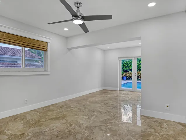 an empty room with windows