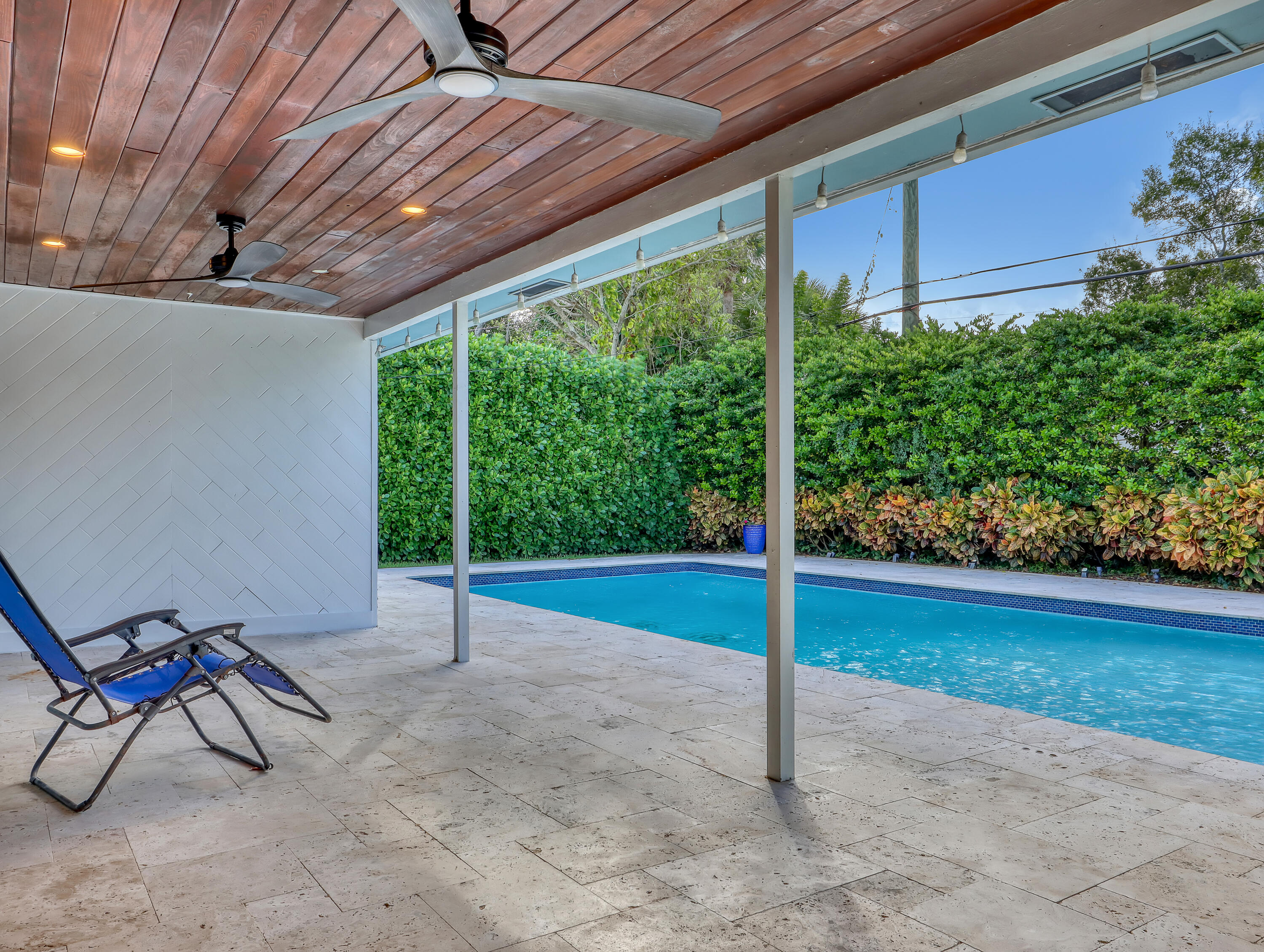 1298 Northwest 4th Street Boca Raton, FL 33486 - Photo 29 of 36 a view of a backyard with plants and a patio