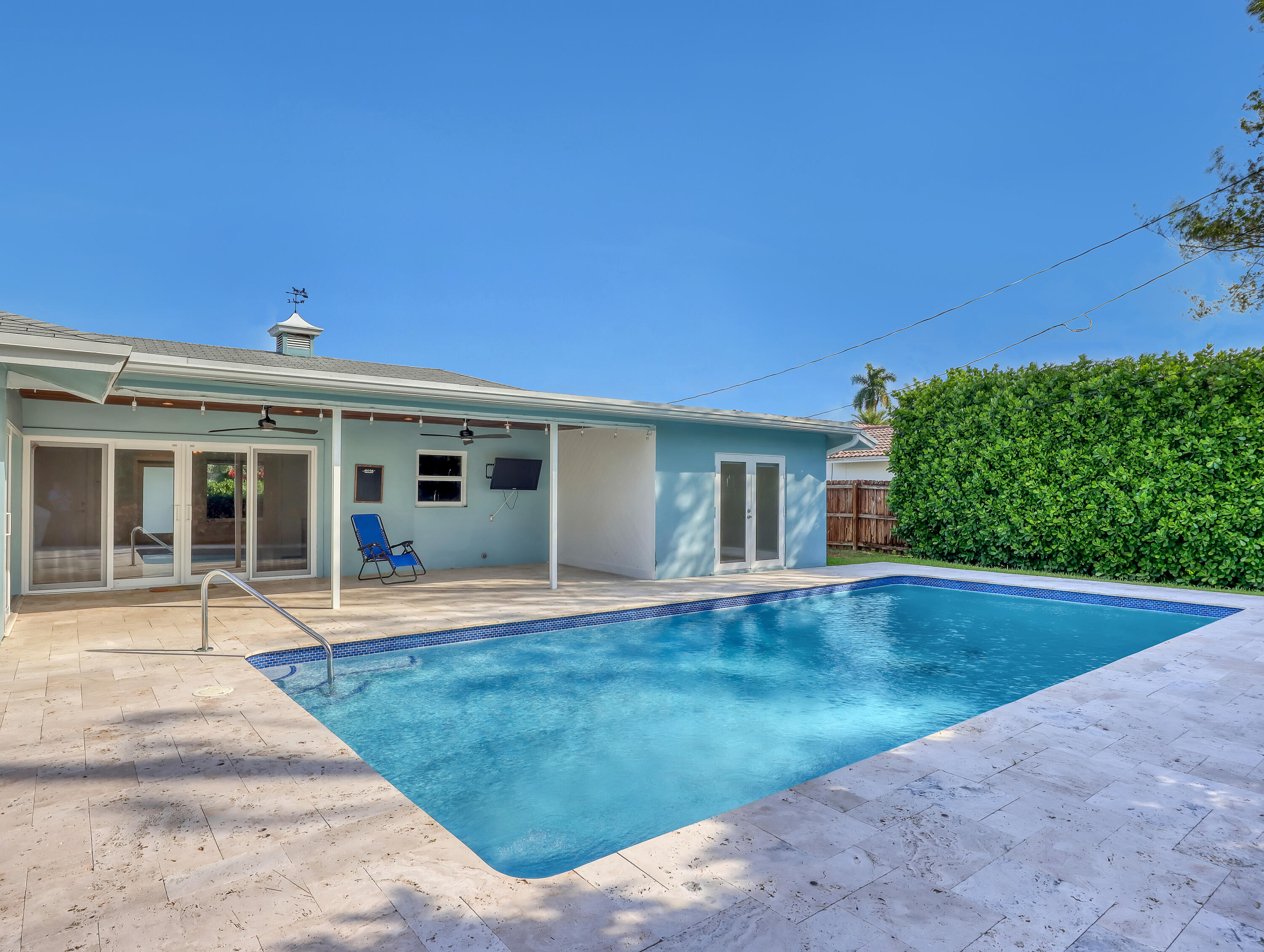 1298 Northwest 4th Street Boca Raton, FL 33486 - Photo 34 of 36 front view of a house with a garden