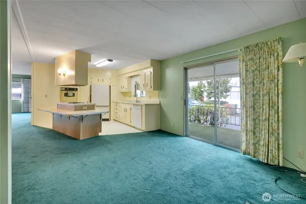 a large bathroom with a large tub and sink