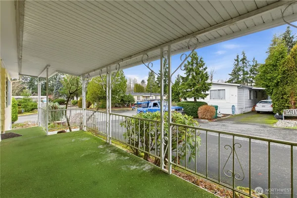 a view of a house with backyard from a patio