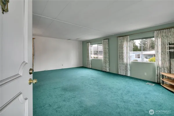 an empty room with windows