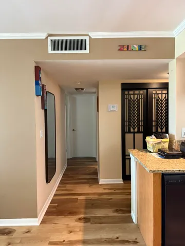 a bathroom with a double vanity sink and mirror