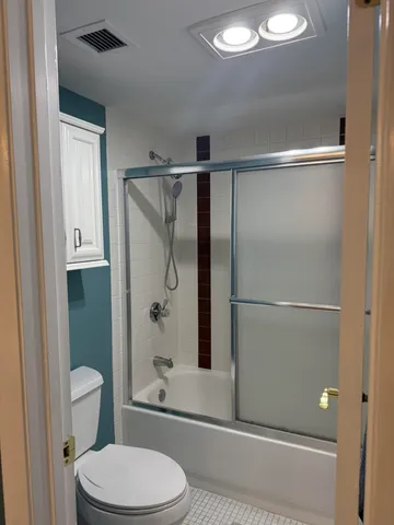 a view of swimming pool from a balcony