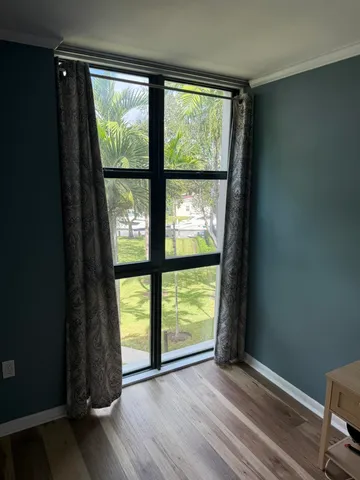 a view of swimming pool with chairs