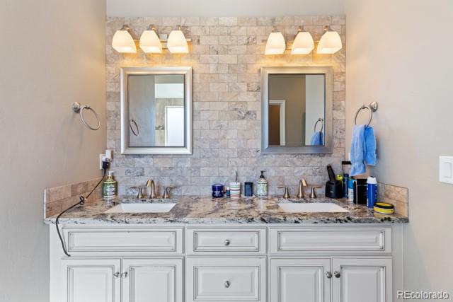 1326 Fairway Drive Fruita, CO 81521 - Photo 19 of 22 a bathroom with a sink double vanity and a mirror