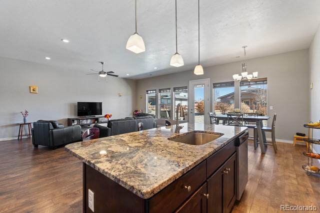 1326 Fairway Drive Fruita, CO 81521 - Photo 7 of 22 a large kitchen with kitchen island a large counter space and stainless steel appliances