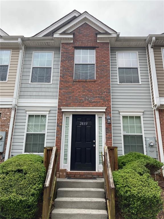 2833 Vining Ridge Terrace Decatur, GA 30034 - Photo 1 of 1 a front view of a house with a yard