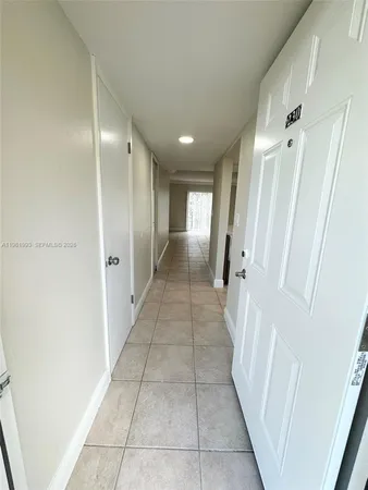 a bathroom with a sink and vanity