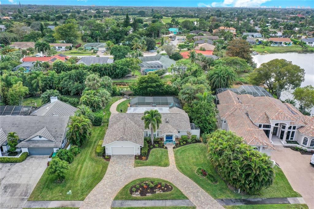 2113 Imperial Golf Course Boulevard Naples, FL 34110 - Photo 2 of 42 an aerial view of multiple house