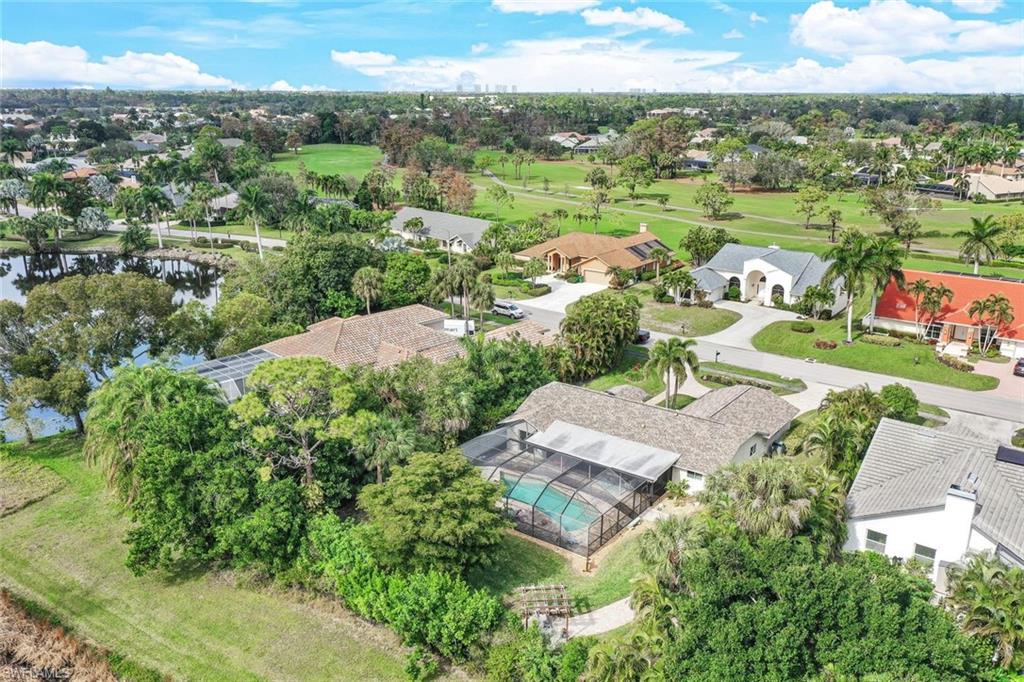 2113 Imperial Golf Course Boulevard Naples, FL 34110 - Photo 34 of 42 an aerial view of residential houses with outdoor space and river