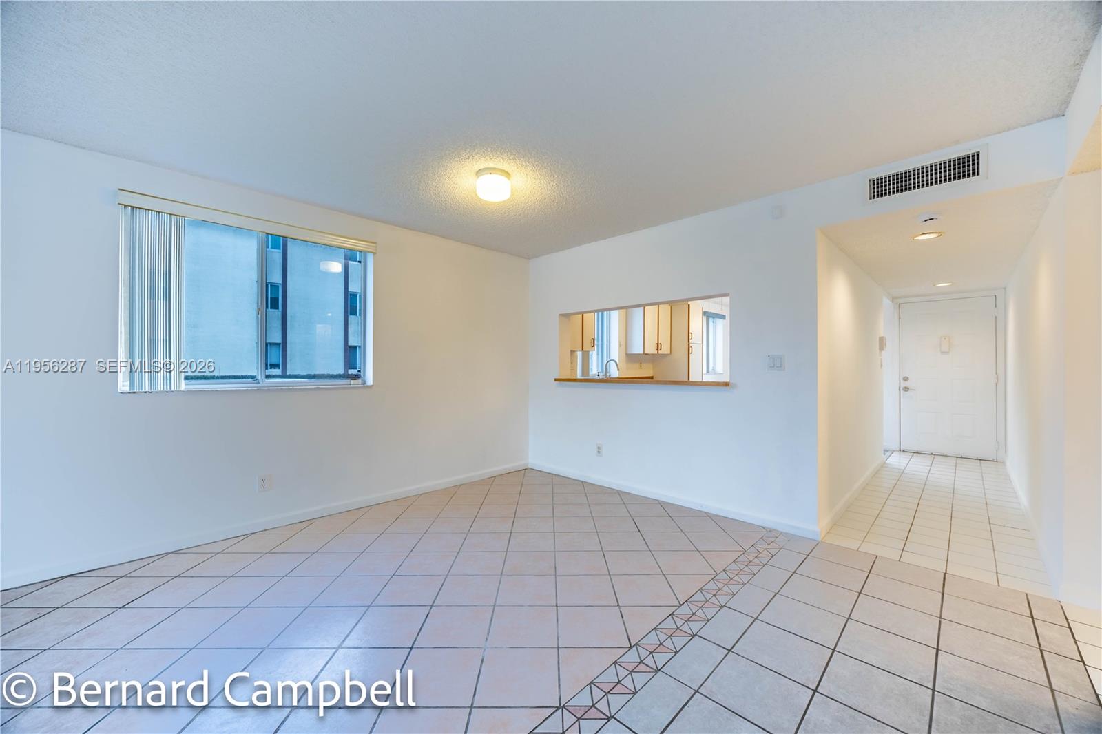 7264 South Devon Drive, Unit 112 Tamarac, FL 33321 - Photo 13 of 45 a view of an empty room and window