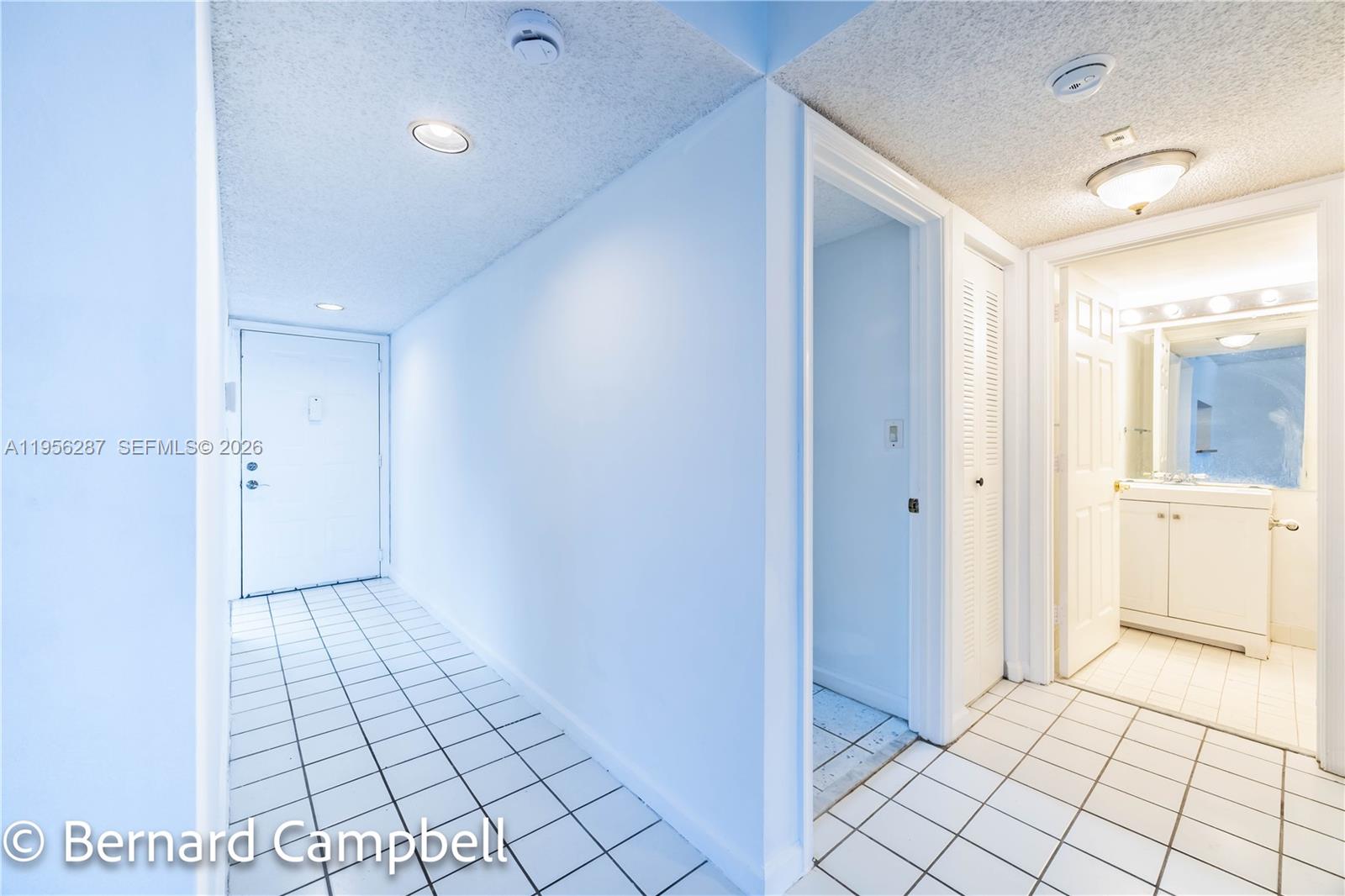 7264 South Devon Drive, Unit 112 Tamarac, FL 33321 - Photo 15 of 45 a view of a bathroom with a shower and a sink