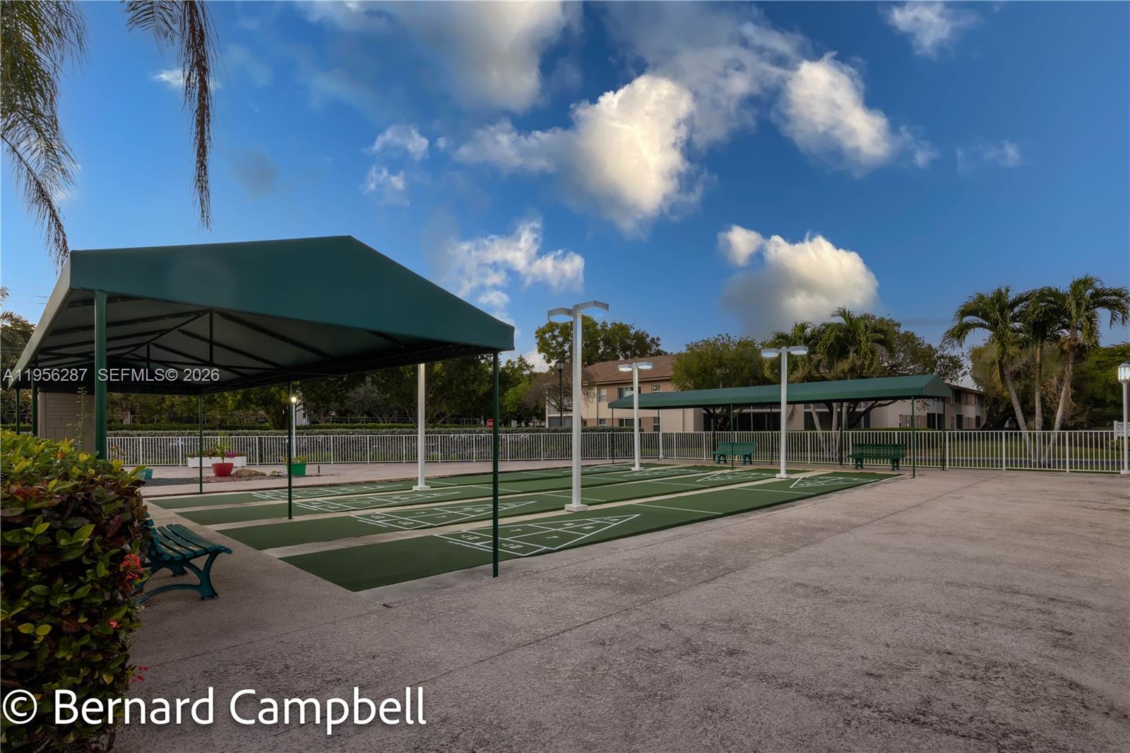 7264 South Devon Drive, Unit 112 Tamarac, FL 33321 - Photo 34 of 45 a view of a backyard