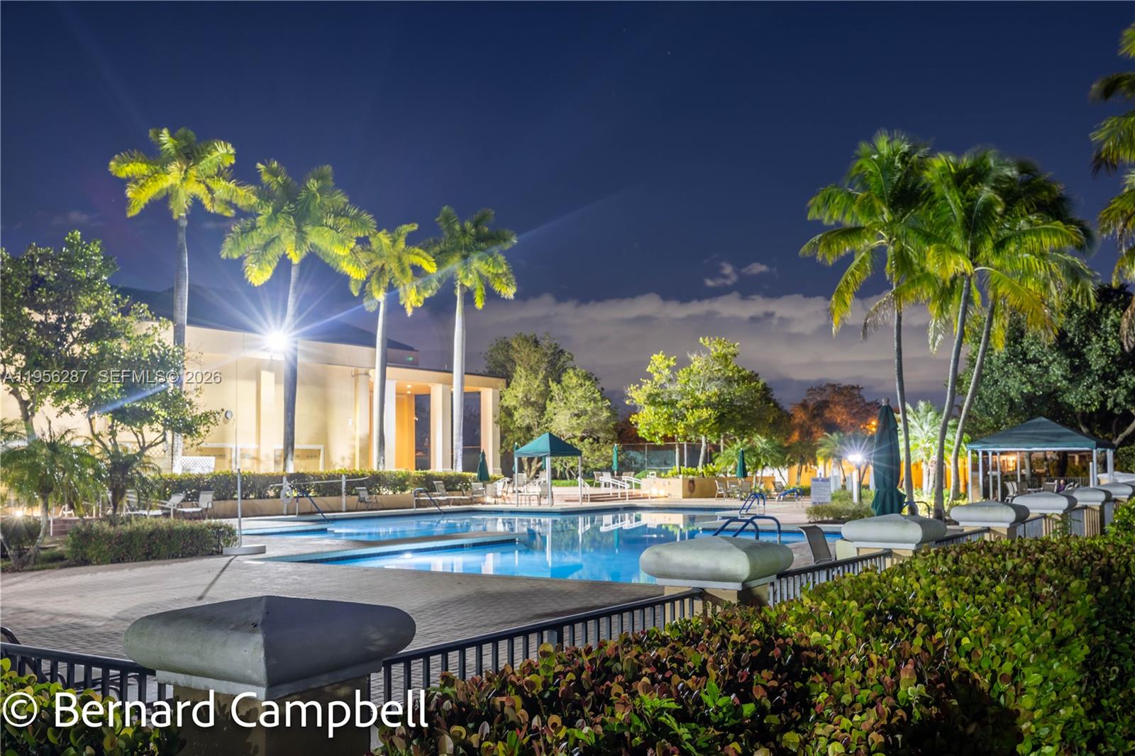 7264 South Devon Drive, Unit 112 Tamarac, FL 33321 - Photo 40 of 45 a view of a swimming pool with a patio