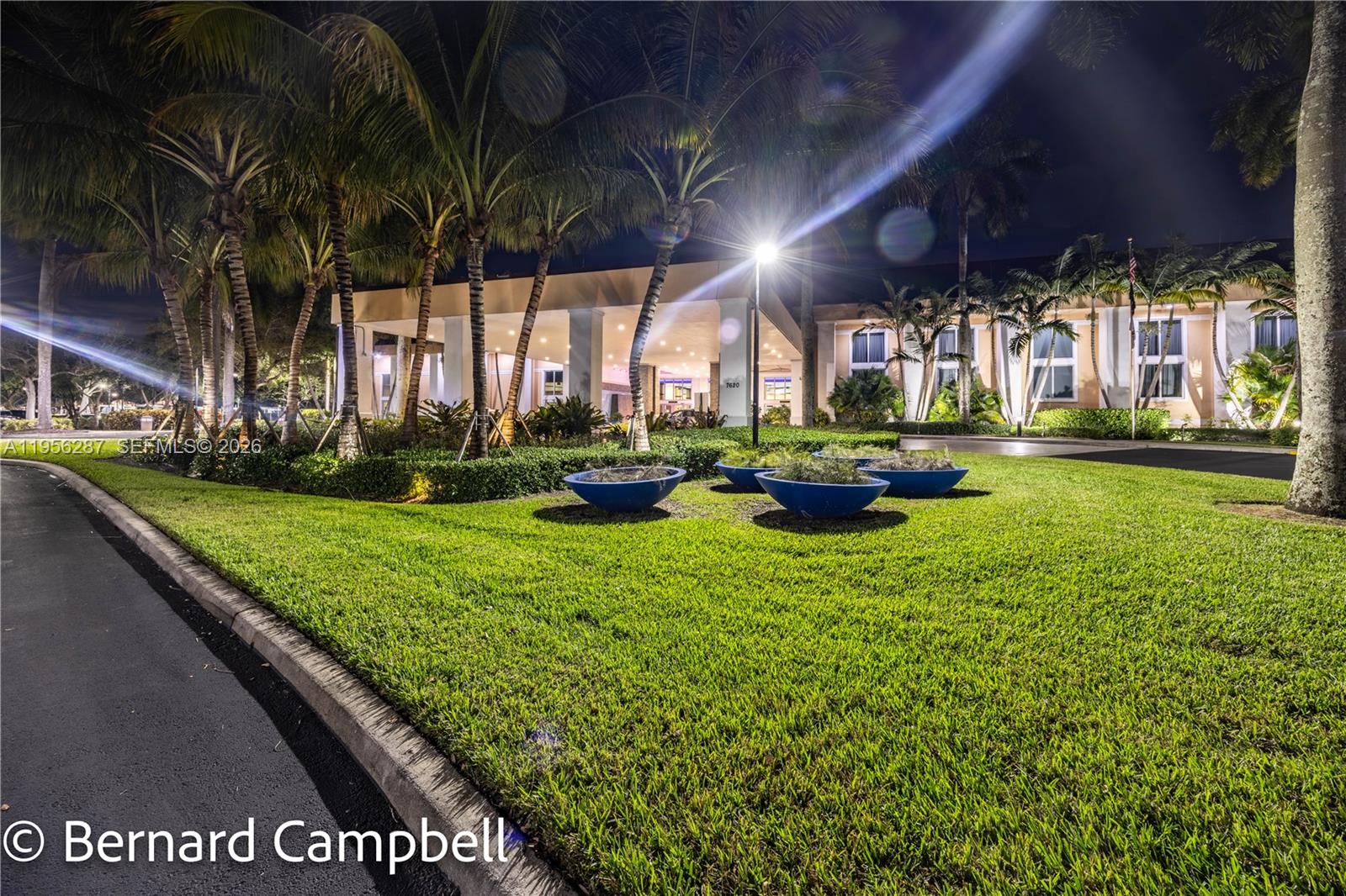 7264 South Devon Drive, Unit 112 Tamarac, FL 33321 - Photo 41 of 45 a front view of a house with garden