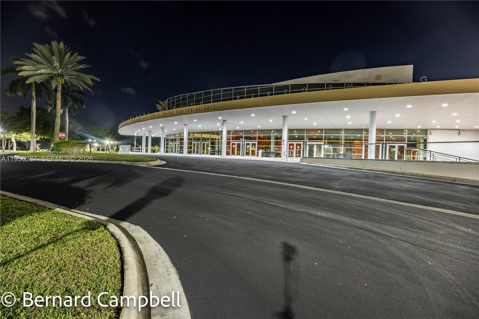 7264 South Devon Drive, Unit 112 Tamarac, FL 33321 - Photo 42 of 45 a front view of a building with a garden