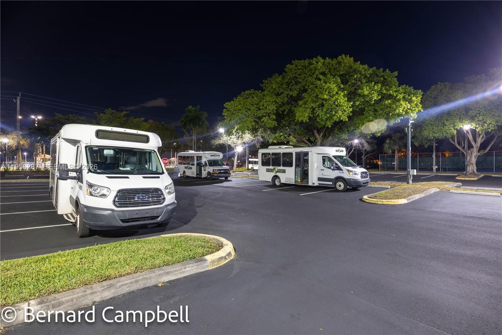 7264 South Devon Drive, Unit 112 Tamarac, FL 33321 - Photo 43 of 45 a view of outdoor space with garden and car parked