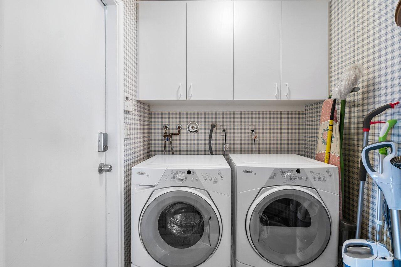 1410 Bethpage Way Greenacres, FL 33413 - Photo 21 of 29 a utility room with dryer and washer