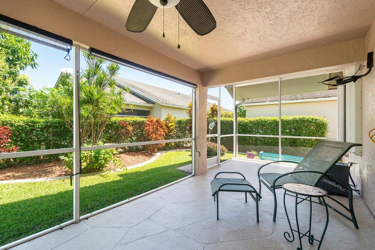 1410 Bethpage Way Greenacres, FL 33413 - Photo 24 of 29 a house view with a outdoor seating space