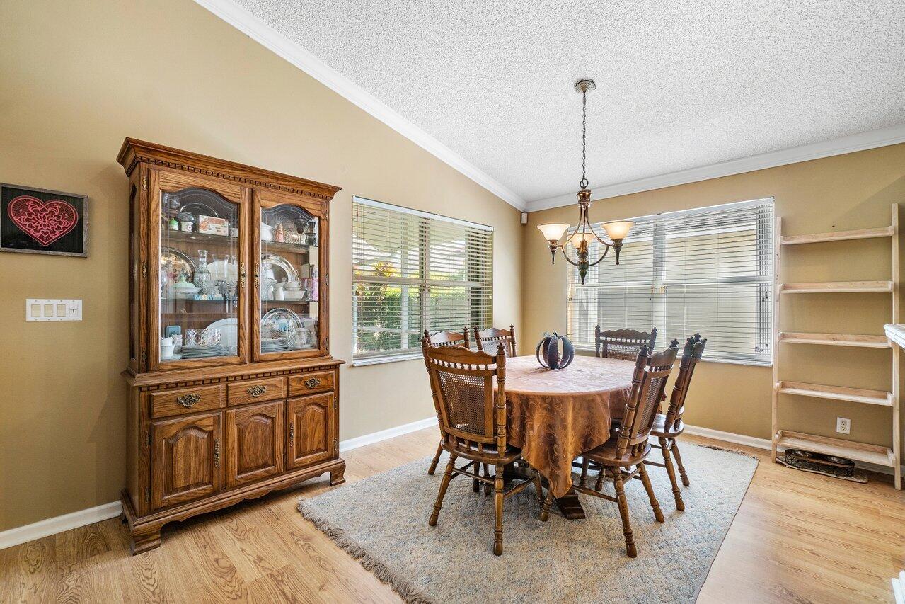 1410 Bethpage Way Greenacres, FL 33413 - Photo 5 of 29 a view of a dining room with furniture window and outside view