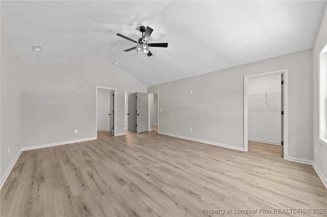 15980 Old Orchard Court Wagram, NC 28396 - Photo 27 of 33 a view of empty room with wooden floor and ceiling fan