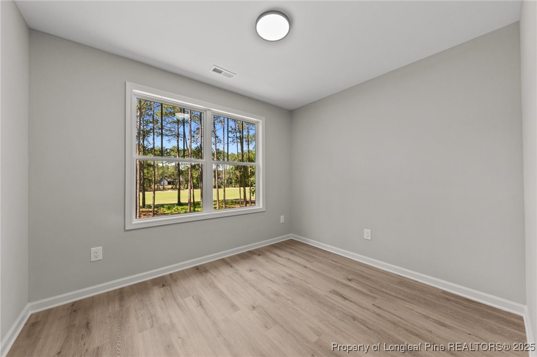 15980 Old Orchard Court Wagram, NC 28396 - Photo 28 of 33 an empty room with a window