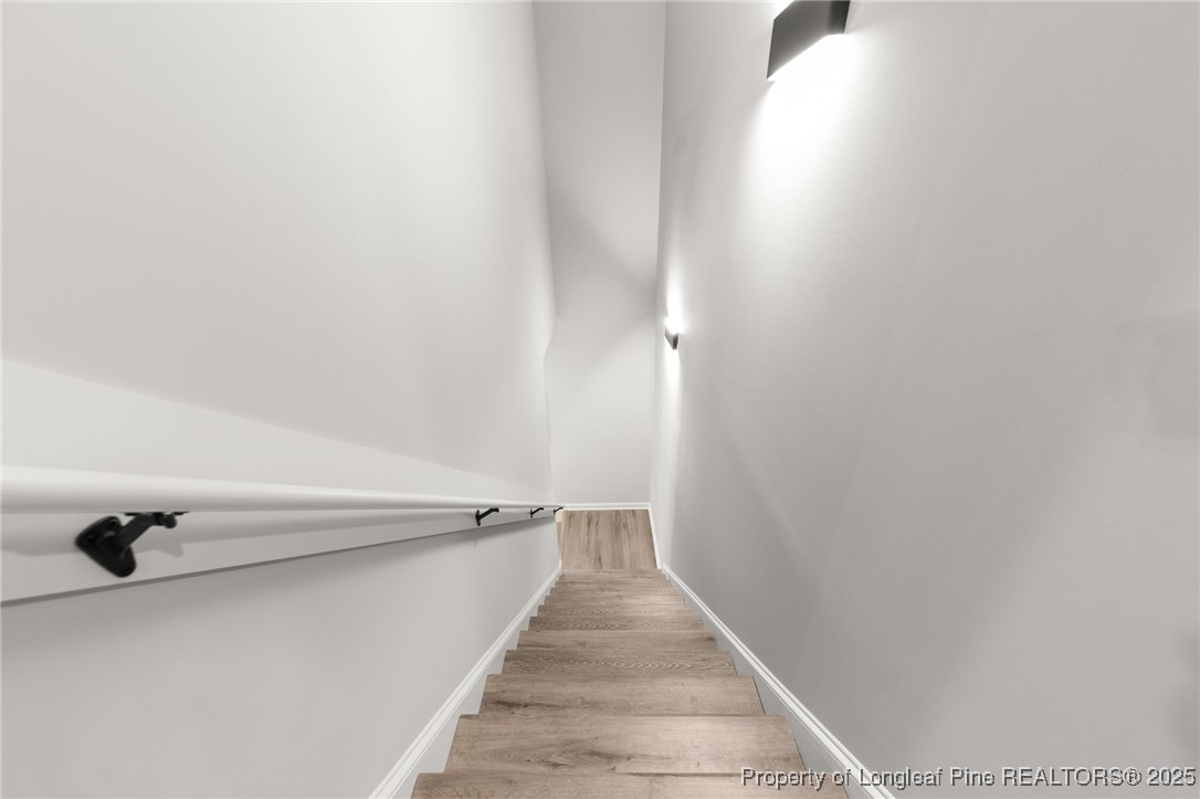 15980 Old Orchard Court Wagram, NC 28396 - Photo 29 of 33 a view of a hallway with stairs